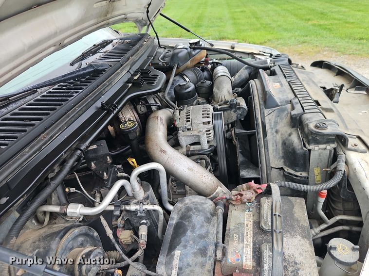 image for item EO7254 2004 Ford F450 Super Duty Ext. Cab flatbed pickup truck