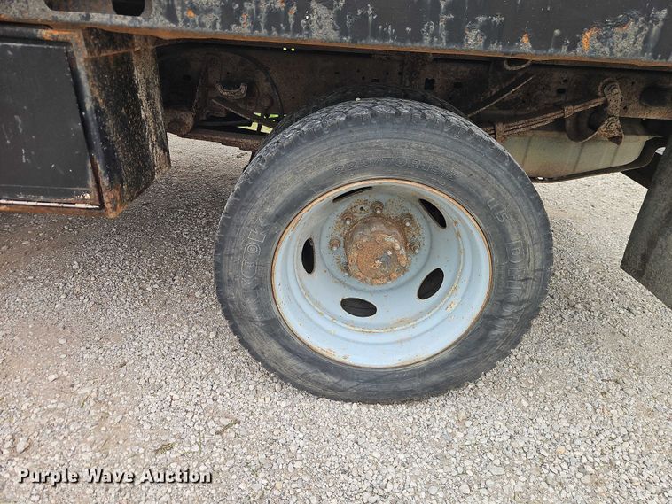 image for item EO7254 2004 Ford F450 Super Duty Ext. Cab flatbed pickup truck