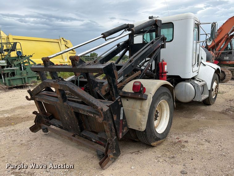 image for item FB8119 1997 Peterbilt 330 dumpster carrier truck