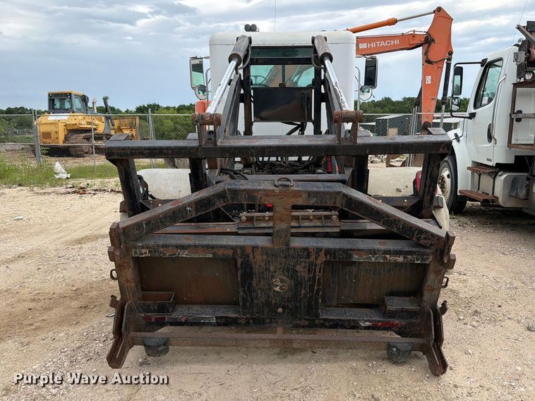 image for item FB8119 1997 Peterbilt 330 dumpster carrier truck