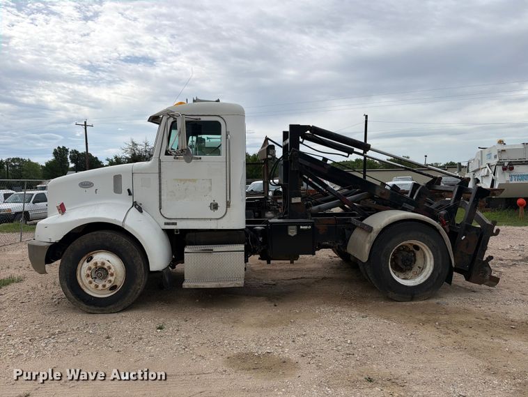 image for item FB8119 1997 Peterbilt 330 dumpster carrier truck