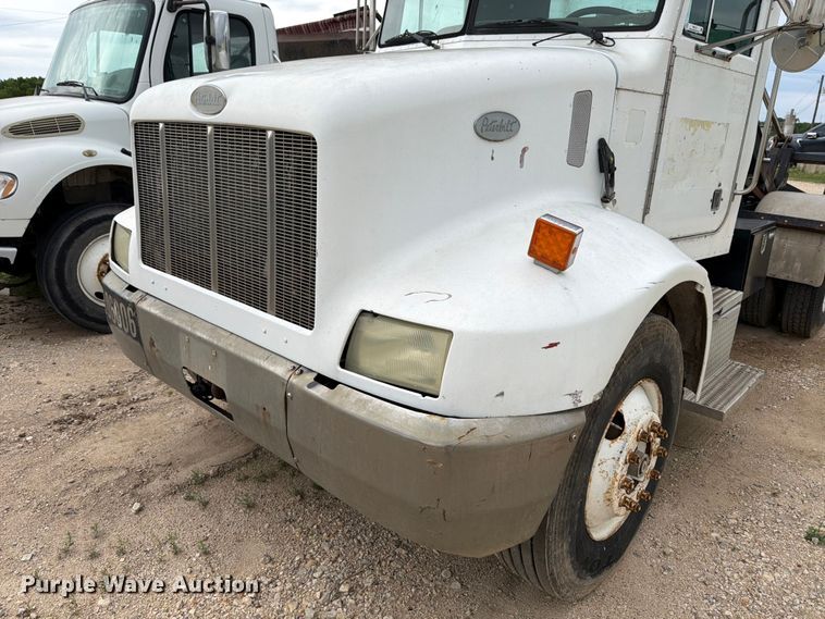 image for item FB8119 1997 Peterbilt 330 dumpster carrier truck