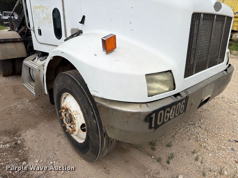 image for item FB8119 1997 Peterbilt 330 dumpster carrier truck