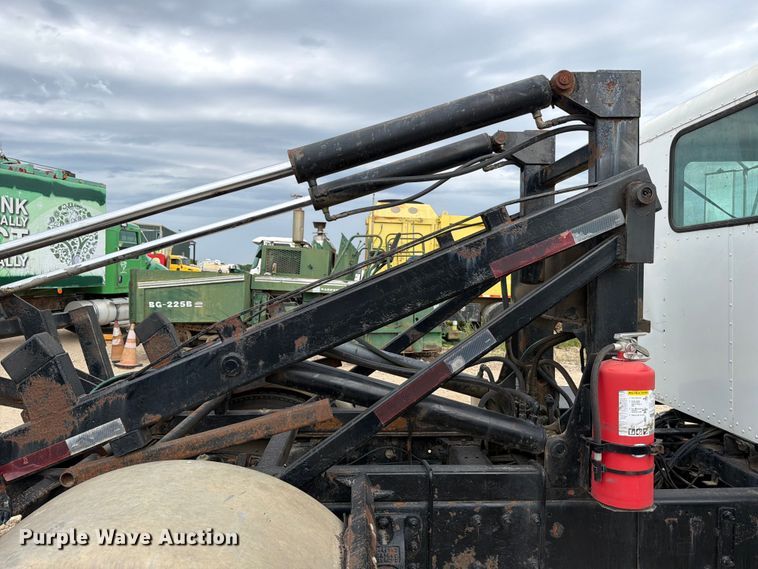 image for item FB8119 1997 Peterbilt 330 dumpster carrier truck