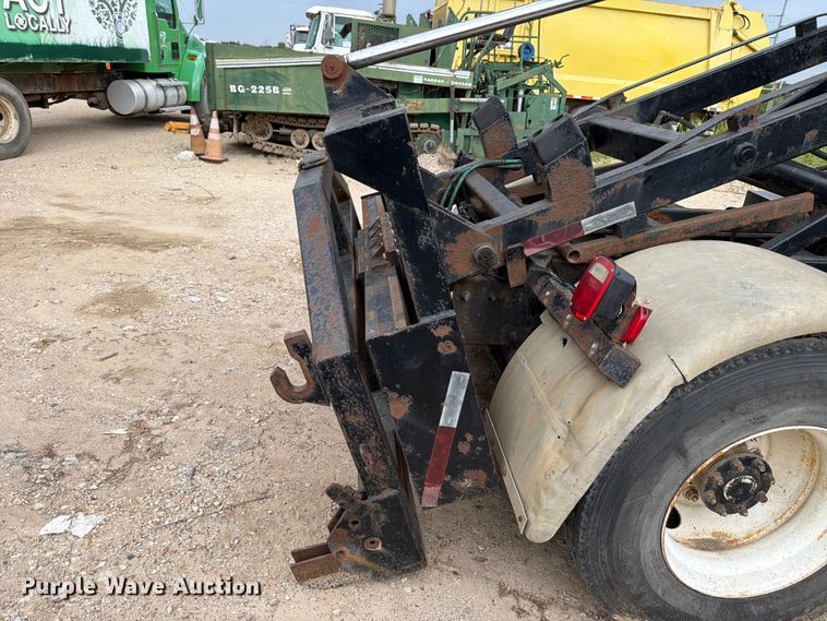 image for item FB8119 1997 Peterbilt 330 dumpster carrier truck