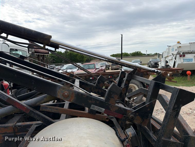 image for item FB8119 1997 Peterbilt 330 dumpster carrier truck