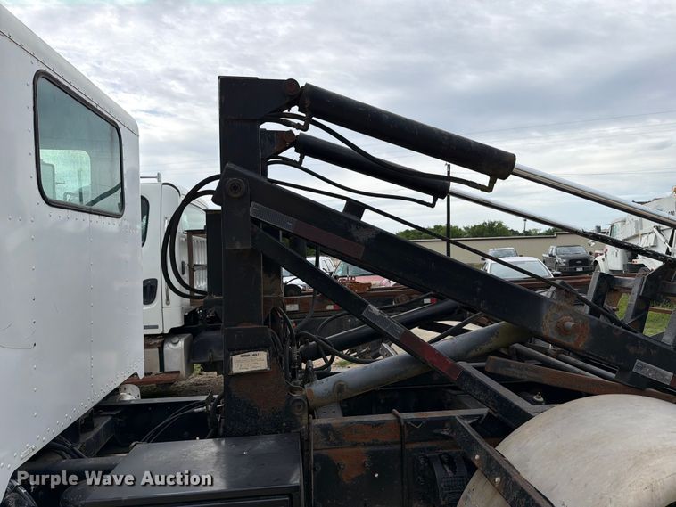image for item FB8119 1997 Peterbilt 330 dumpster carrier truck