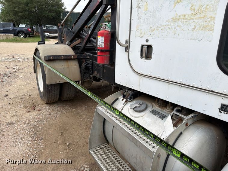 image for item FB8119 1997 Peterbilt 330 dumpster carrier truck