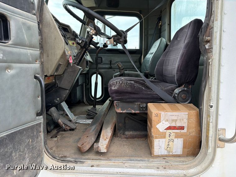 image for item FB8119 1997 Peterbilt 330 dumpster carrier truck