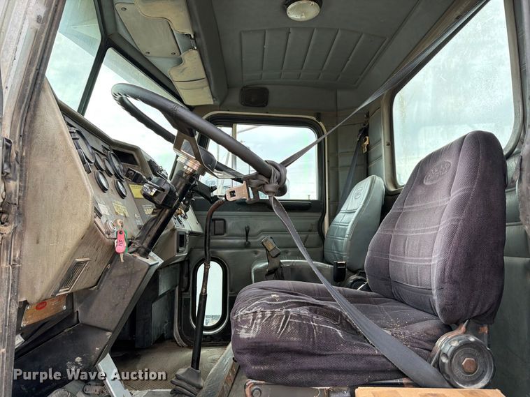 image for item FB8119 1997 Peterbilt 330 dumpster carrier truck