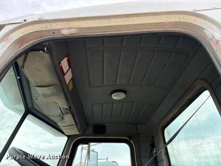 image for item FB8119 1997 Peterbilt 330 dumpster carrier truck