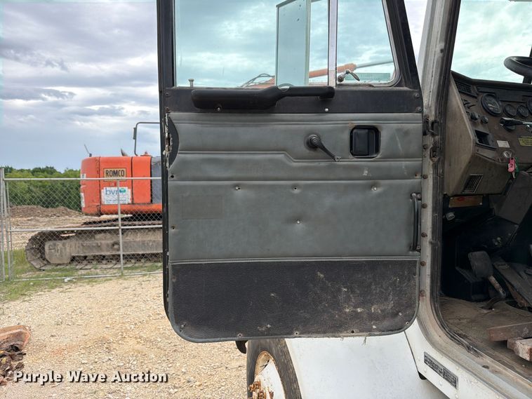 image for item FB8119 1997 Peterbilt 330 dumpster carrier truck