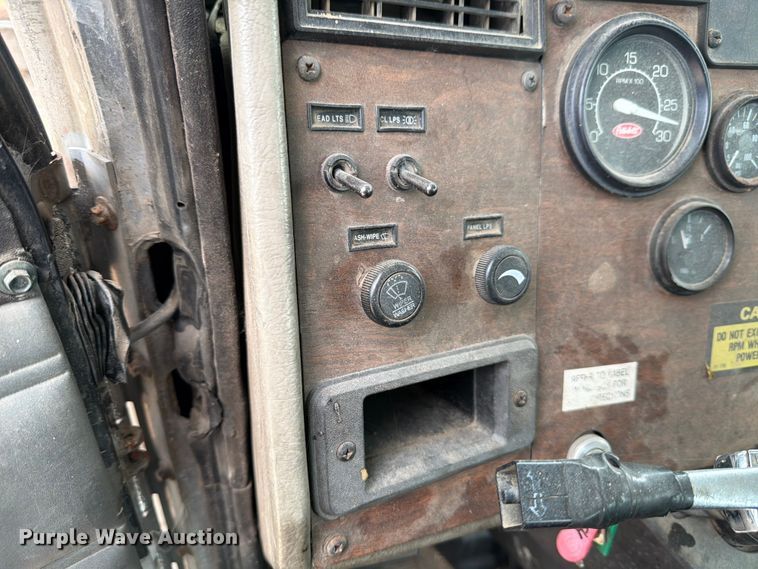 image for item FB8119 1997 Peterbilt 330 dumpster carrier truck