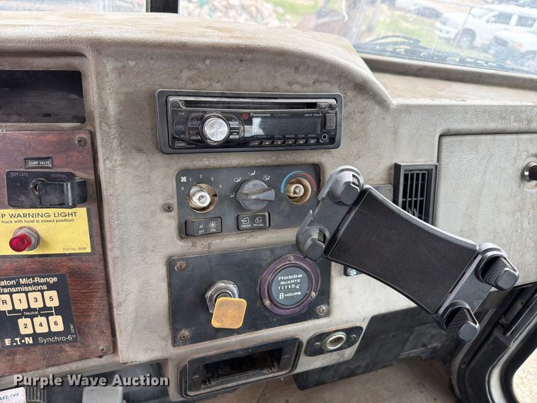 image for item FB8119 1997 Peterbilt 330 dumpster carrier truck