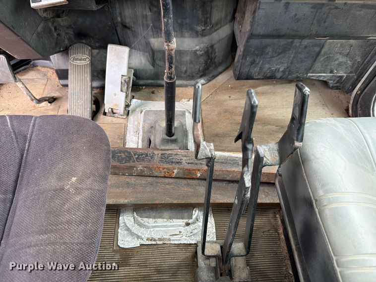 image for item FB8119 1997 Peterbilt 330 dumpster carrier truck