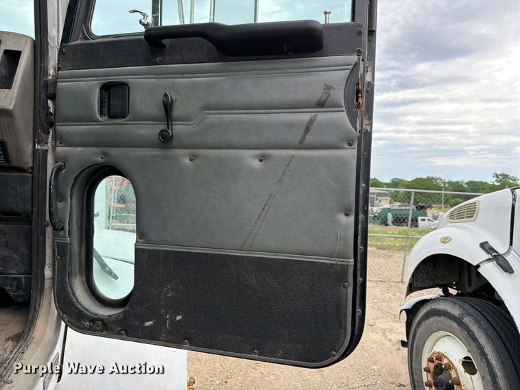 image for item FB8119 1997 Peterbilt 330 dumpster carrier truck