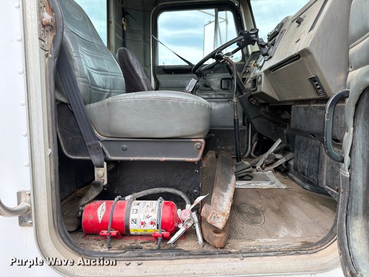 image for item FB8119 1997 Peterbilt 330 dumpster carrier truck