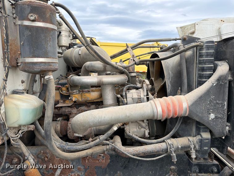 image for item FB8119 1997 Peterbilt 330 dumpster carrier truck