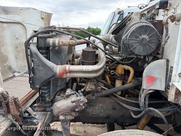 image for item FB8119 1997 Peterbilt 330 dumpster carrier truck