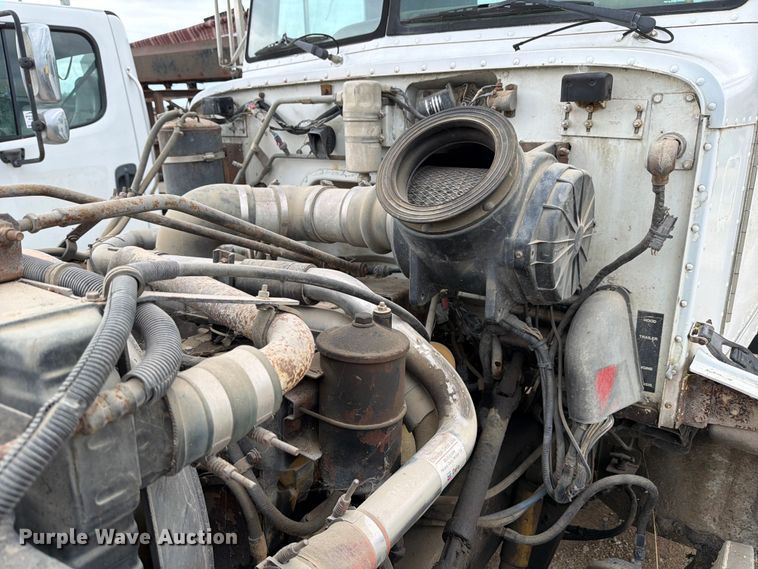 image for item FB8119 1997 Peterbilt 330 dumpster carrier truck