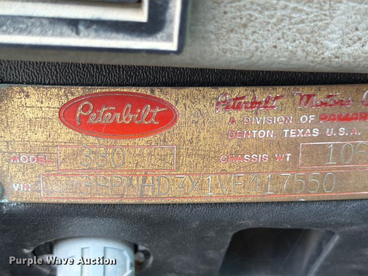 image for item FB8119 1997 Peterbilt 330 dumpster carrier truck