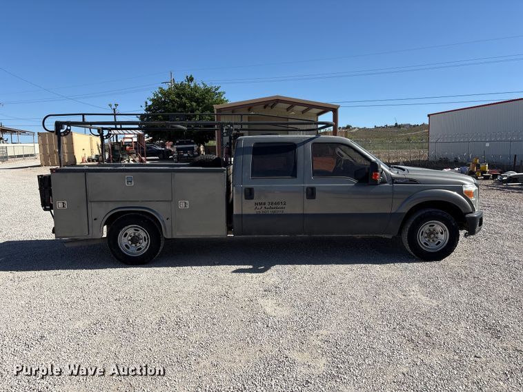 image for item FC2244 2011 Ford F250 Super Duty Crew Cab utility bed pickup truck
