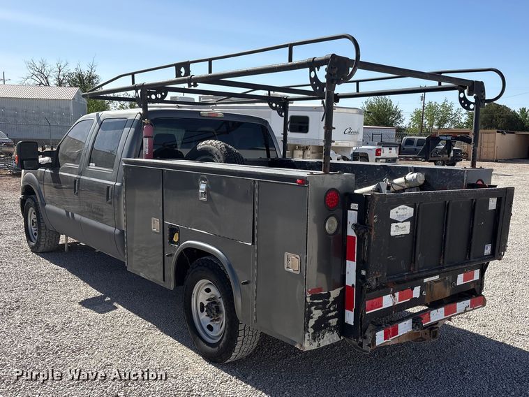 image for item FC2244 2011 Ford F250 Super Duty Crew Cab utility bed pickup truck