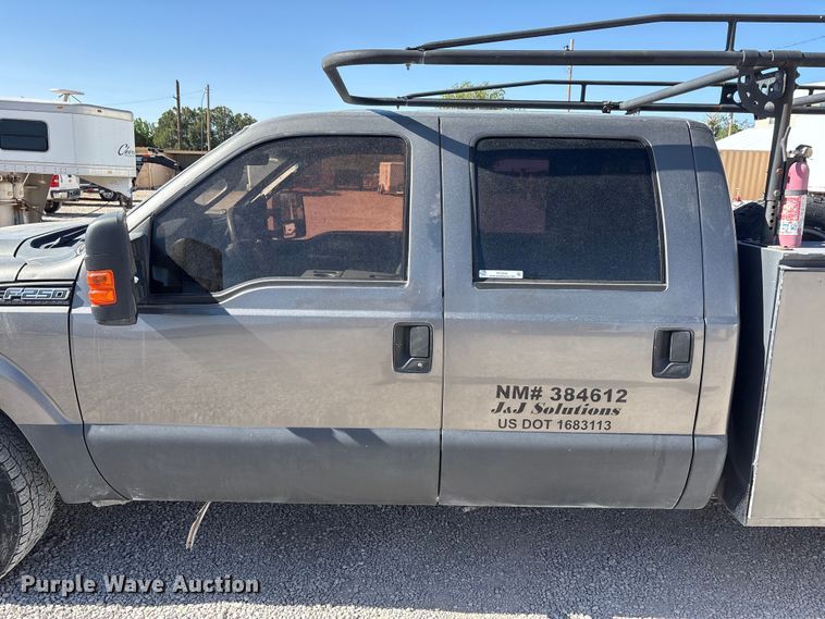 image for item FC2244 2011 Ford F250 Super Duty Crew Cab utility bed pickup truck