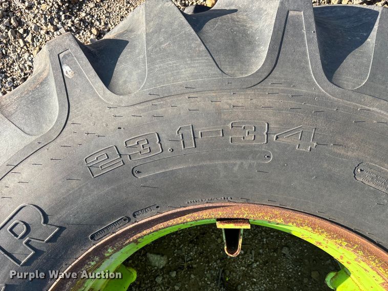 image for item EA4795 (8) 23.1-34 tires and wheels