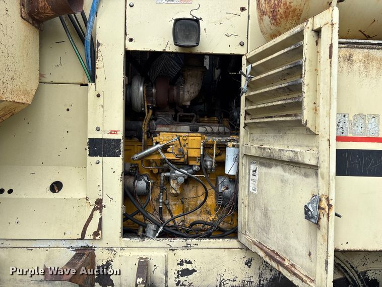 image for item EO4183 1990 Ingersoll Rand ECM690/YH100 drilling rig