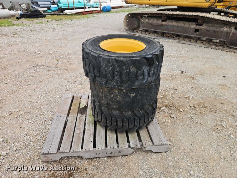 image for item EO7269 (3) 12-16.5 tires and wheels