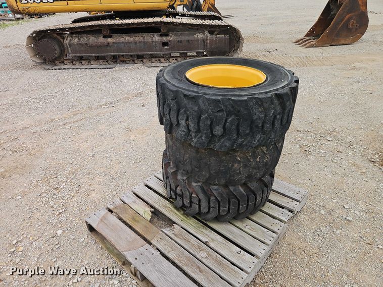 image for item EO7269 (3) 12-16.5 tires and wheels