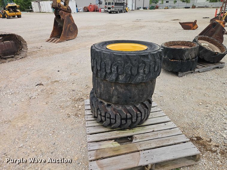 image for item EO7269 (3) 12-16.5 tires and wheels