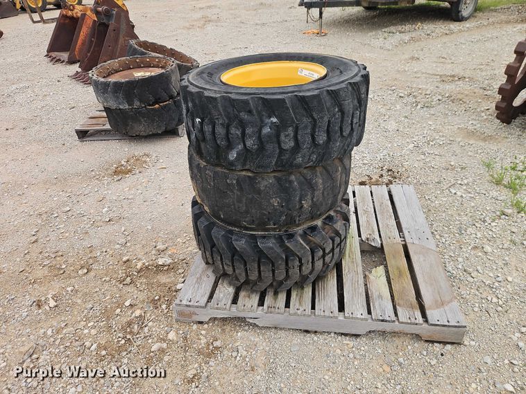 image for item EO7269 (3) 12-16.5 tires and wheels