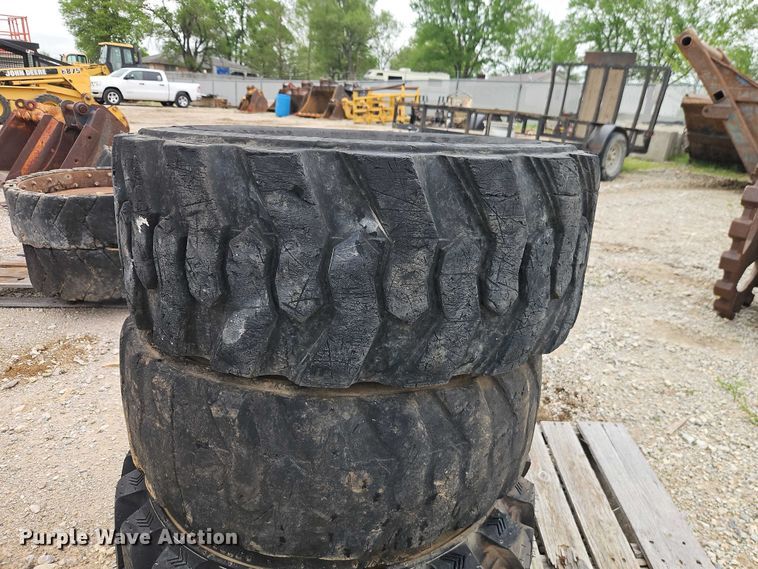 image for item EO7269 (3) 12-16.5 tires and wheels