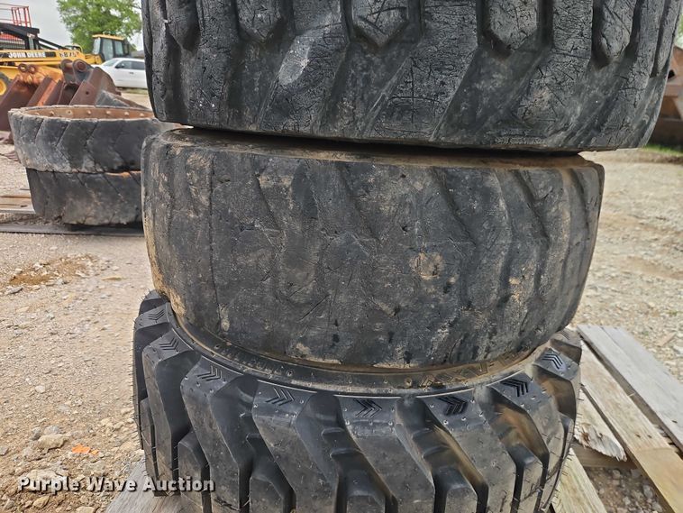 image for item EO7269 (3) 12-16.5 tires and wheels
