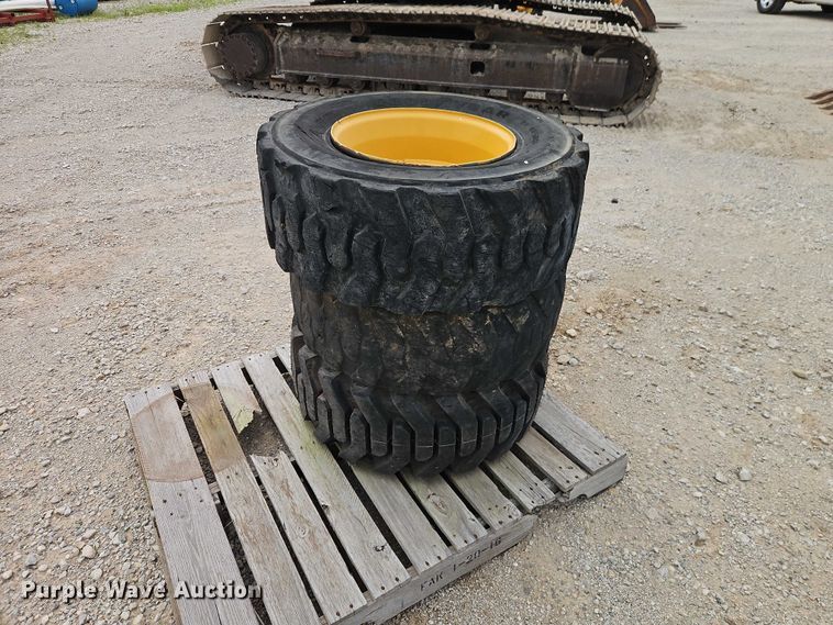 image for item EO7269 (3) 12-16.5 tires and wheels