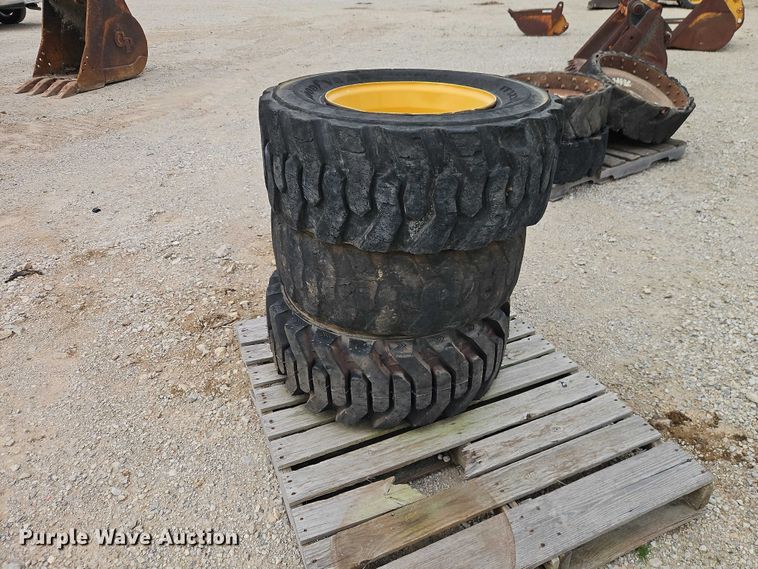 image for item EO7269 (3) 12-16.5 tires and wheels