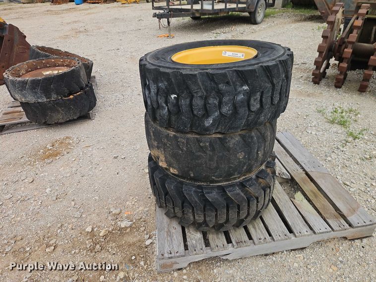 image for item EO7269 (3) 12-16.5 tires and wheels