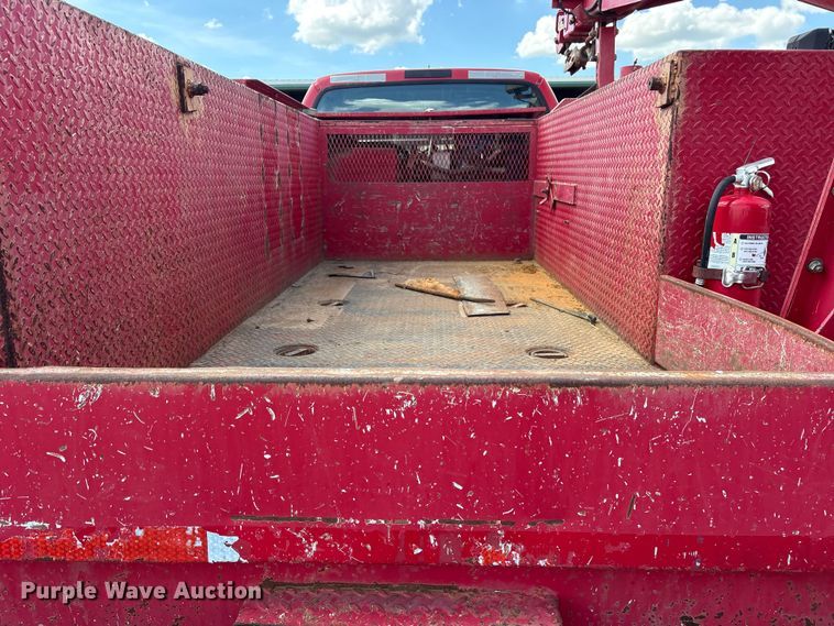 image for item ES8884 2000 Ford F750 Ext. Cab utility / service truck