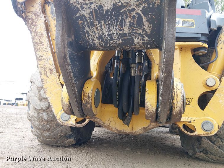 image for item ES8937 2018 John Deere 310SL backhoe