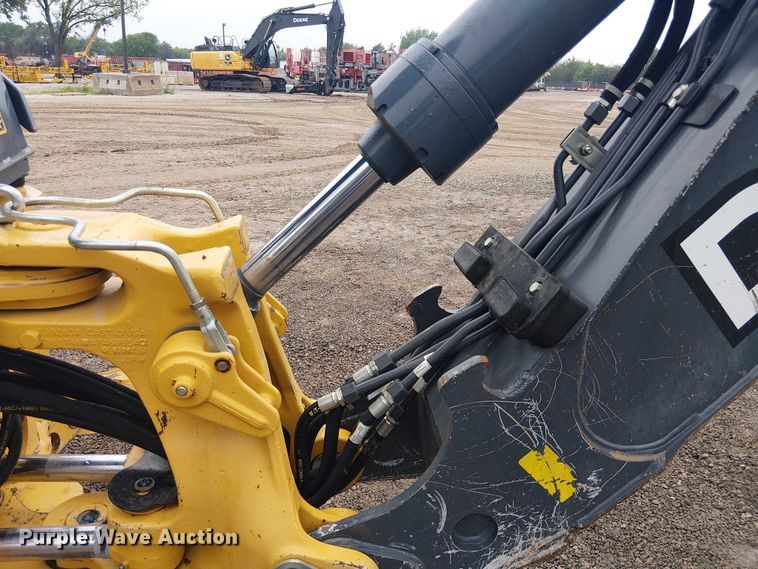 image for item ES8937 2018 John Deere 310SL backhoe