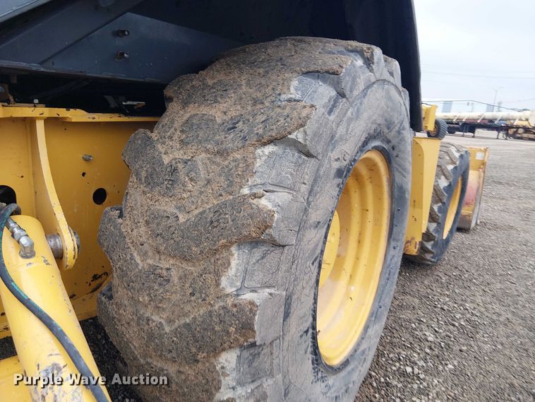 image for item ES8937 2018 John Deere 310SL backhoe