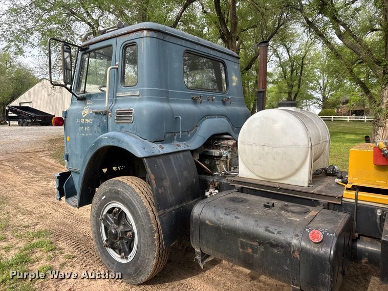 image for item ET1932 1980 International Cargostar 1850 B truck cab and chassis with tree spade