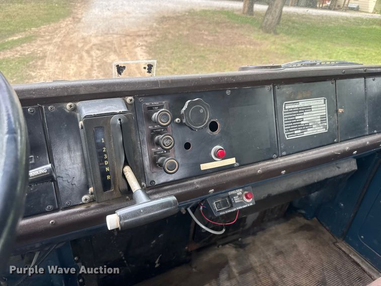 image for item ET1932 1980 International Cargostar 1850 B truck cab and chassis with tree spade