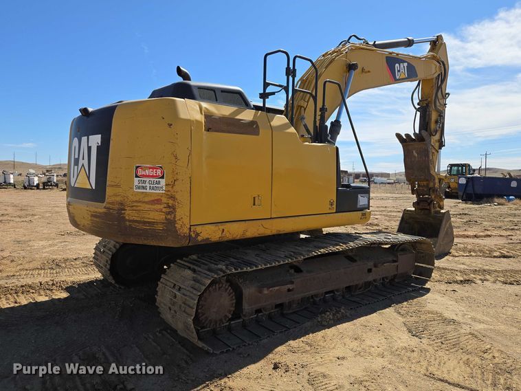 image for item EV5912 2012 Caterpillar 320E L excavator