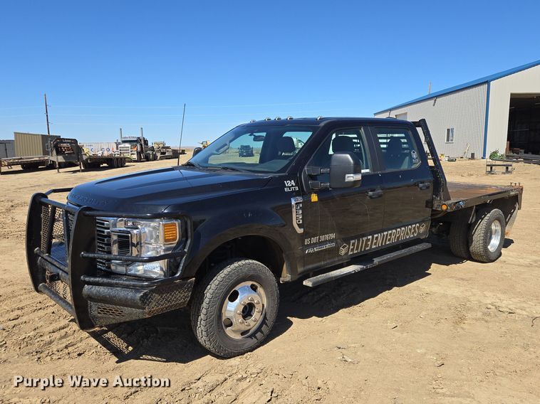 image for item EV5917 2022 Ford F350 Crew Cab flatbed pickup truck