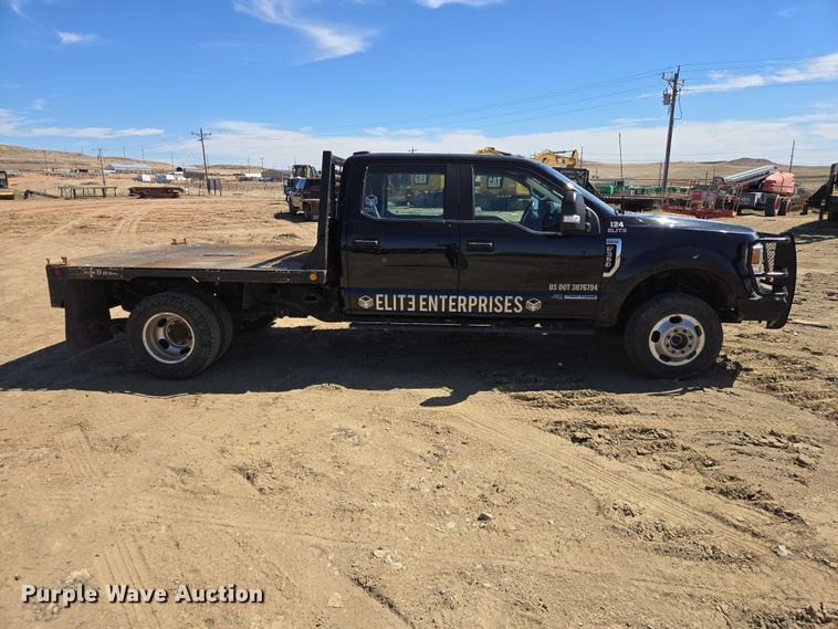 image for item EV5917 2022 Ford F350 Crew Cab flatbed pickup truck