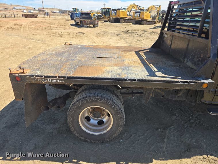 image for item EV5917 2022 Ford F350 Crew Cab flatbed pickup truck
