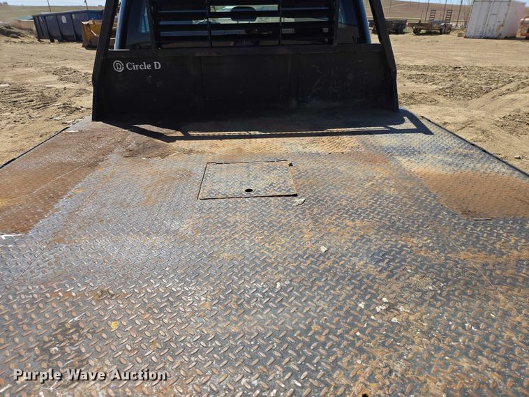 image for item EV5917 2022 Ford F350 Crew Cab flatbed pickup truck
